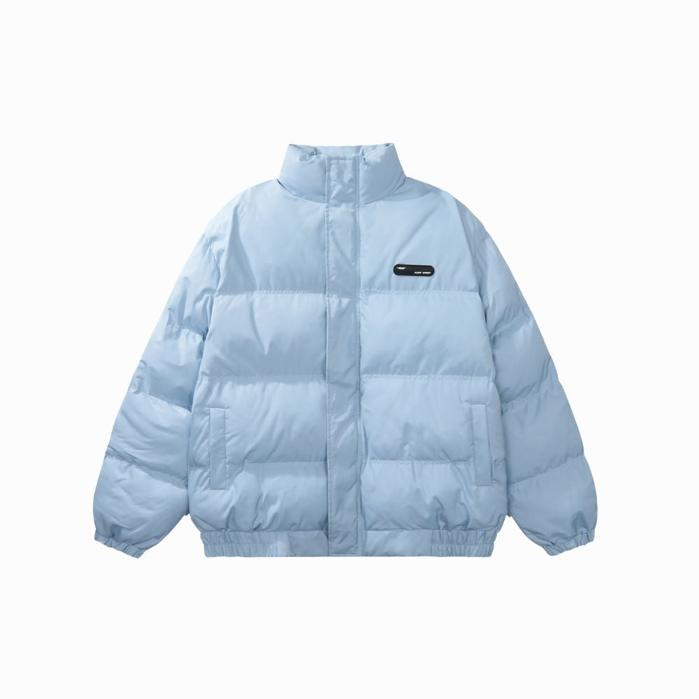 Light blue puffer jacket on a white background