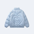 Blue. A light blue puffer jacket shown from the back, featuring a large quilted heart design in the center with a smaller heart motif inside it.