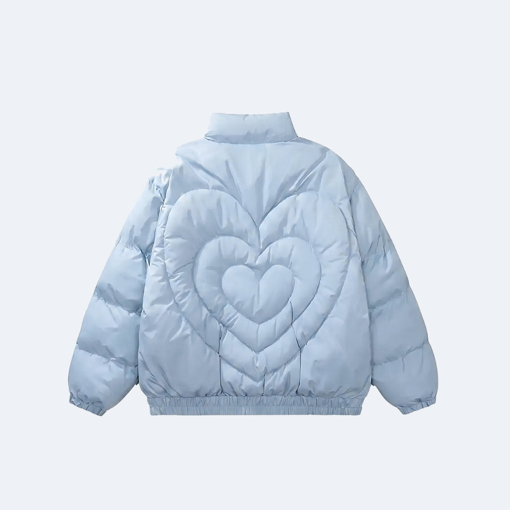 Blue. A light blue puffer jacket shown from the back, featuring a large quilted heart design in the center with a smaller heart motif inside it.