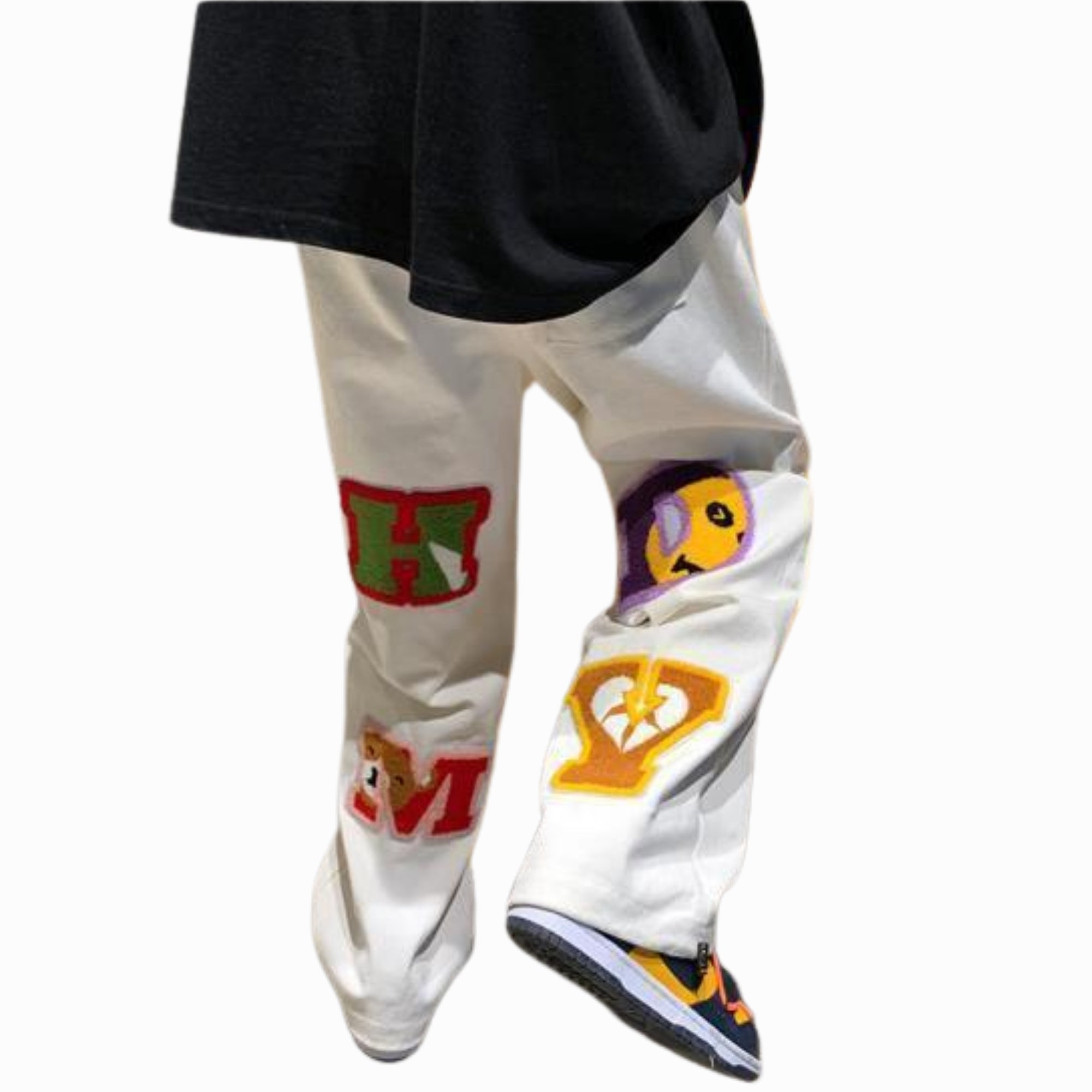 White pants with colorful graphics and text on a white background