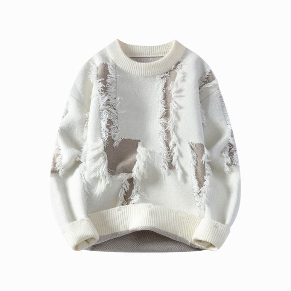 White sweater with lace detailing on a white background