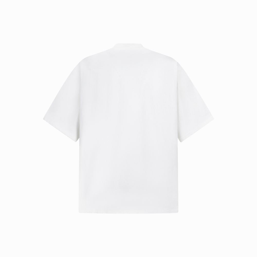 Plain white t-shirt on a light beige background