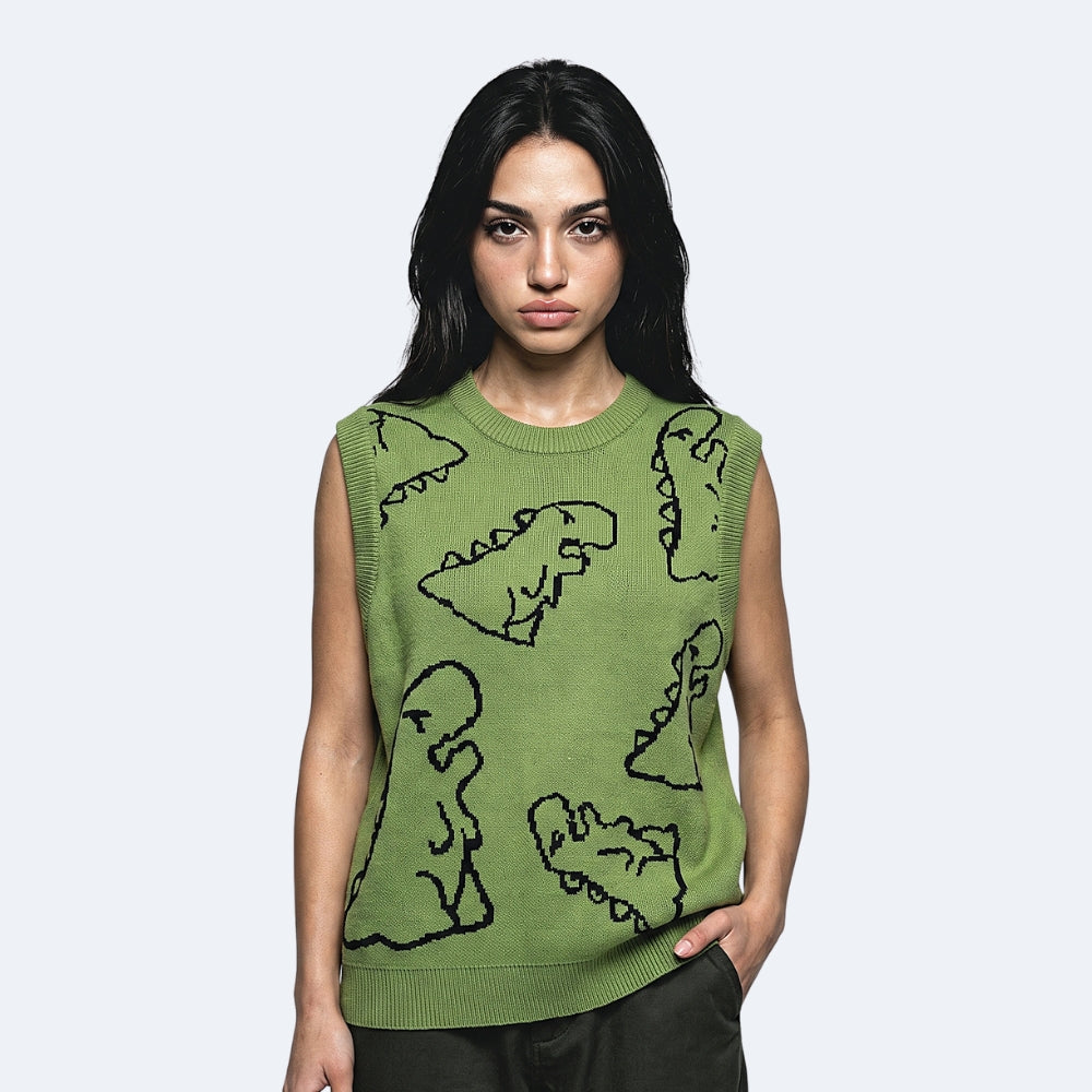 Green. A woman modeling a sleeveless knit sweater vest in olive green with black hand-knit abstract line patterns.