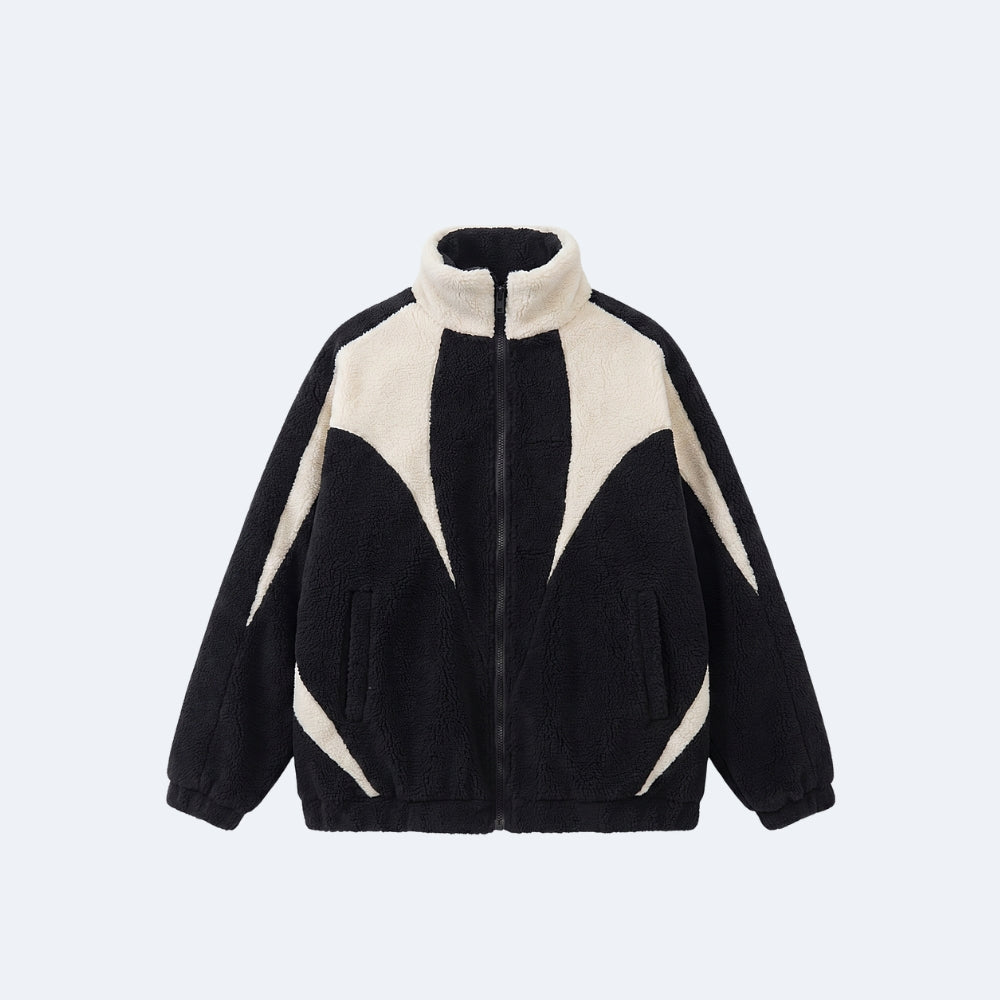 Black. A black and cream color-blocked sherpa fleece zip-up jacket with a stand-up collar.