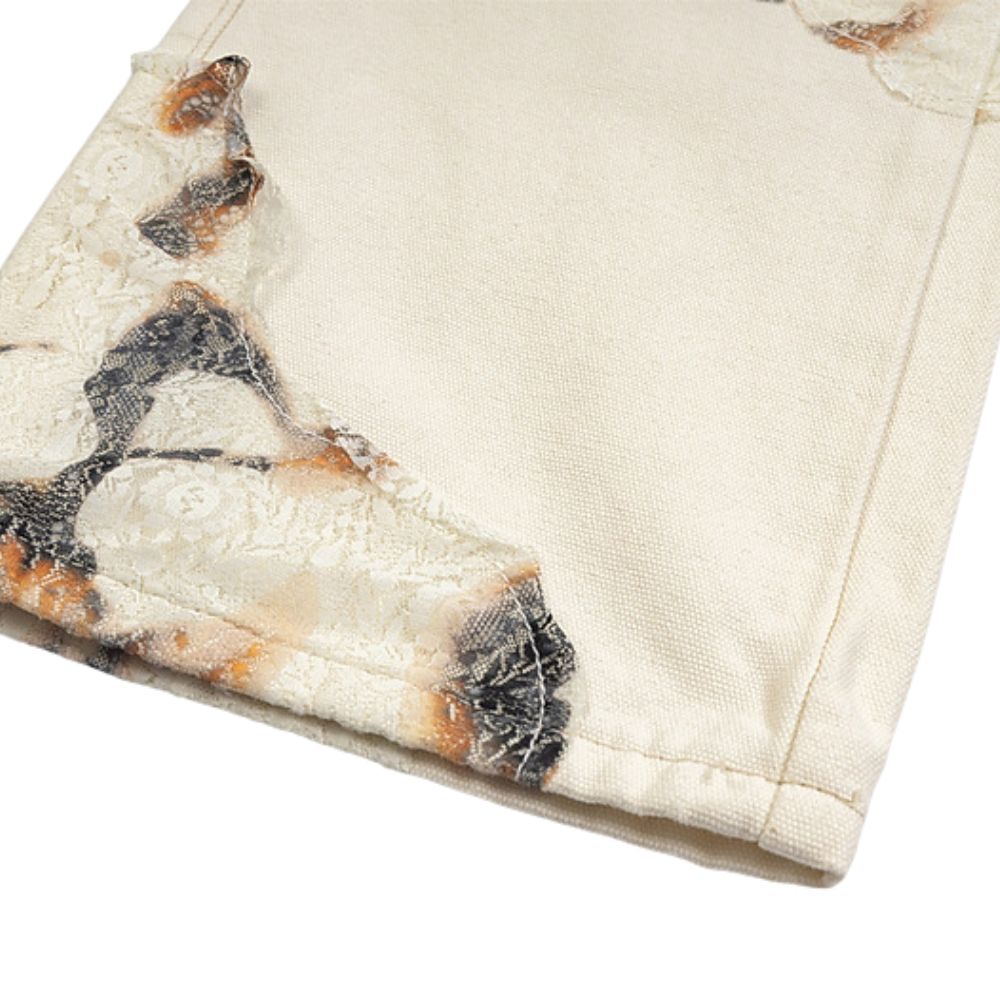 Close-up of a textured fabric corner with a neutral color palette.