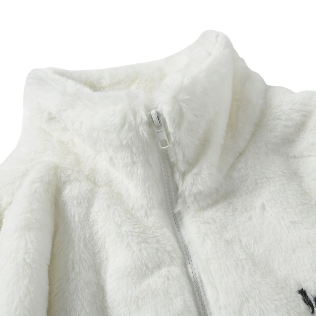 Close-up of a white fleece jacket with a zipper on a white background