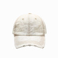 Beige denim cap on a white background