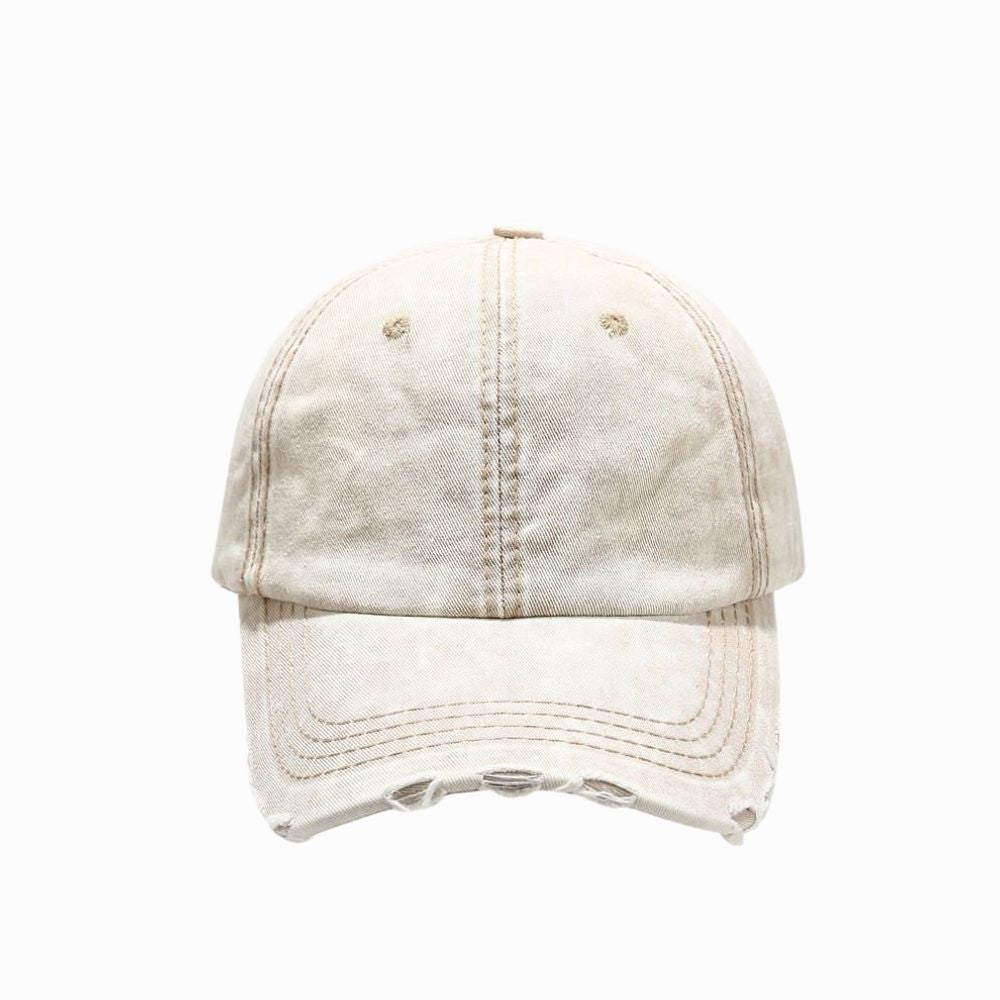 Beige denim cap on a white background