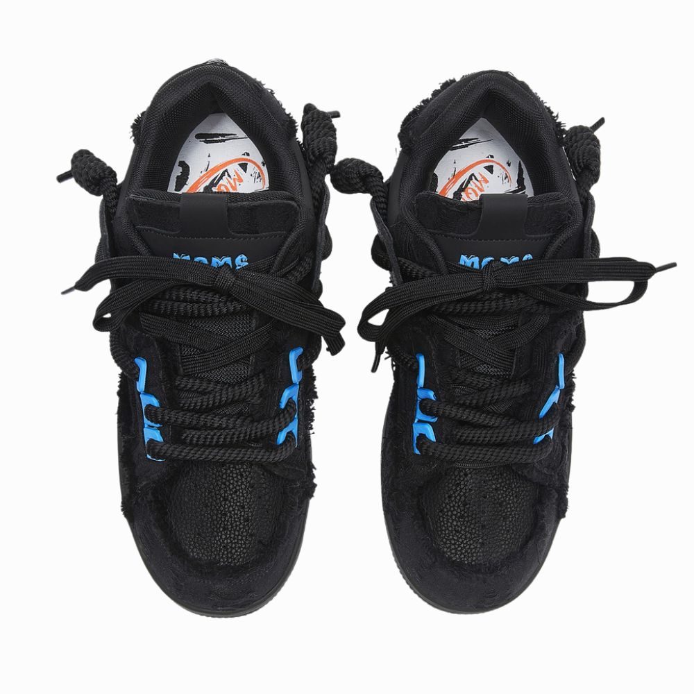 Black sneakers with blue accents on a white background