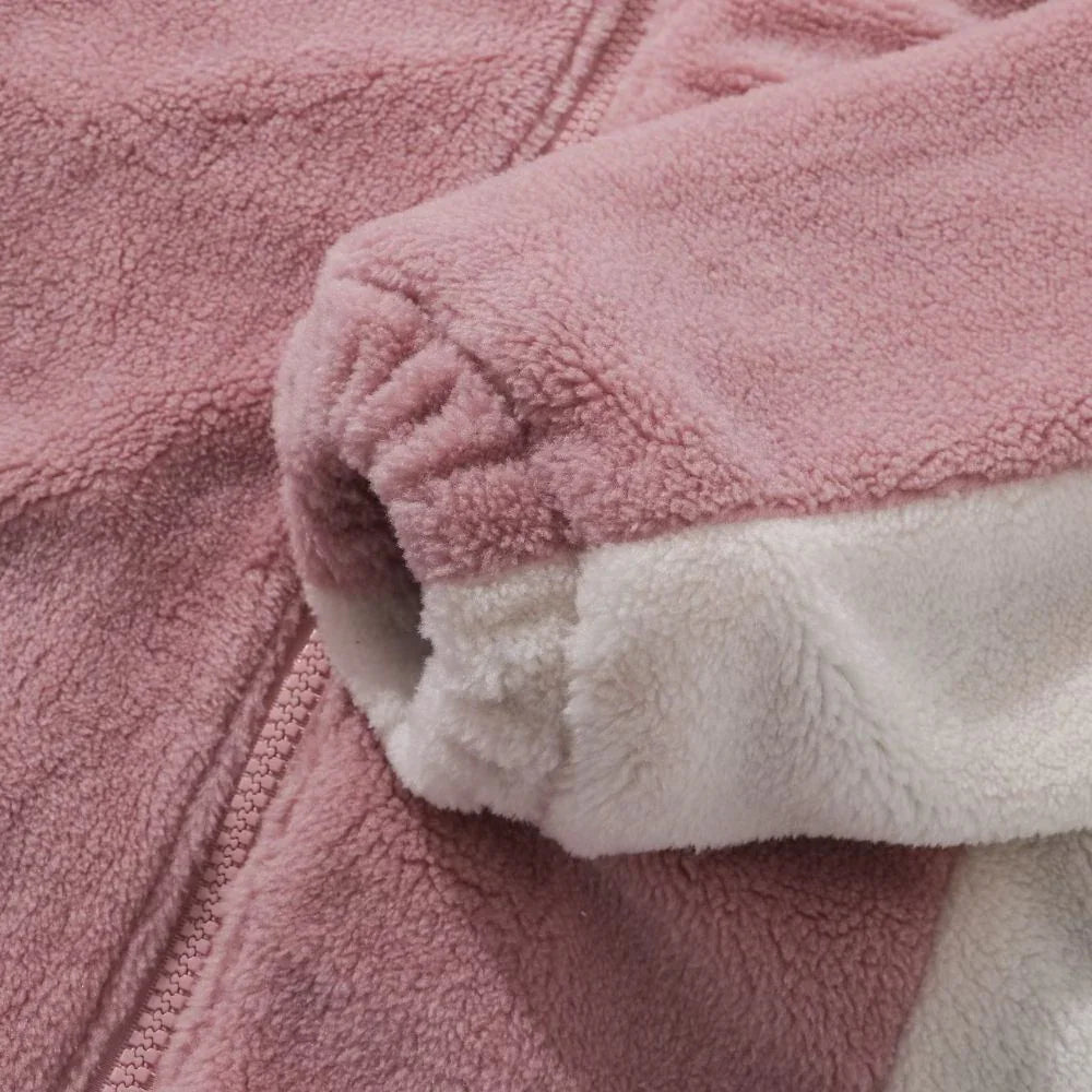 Close-up of a pink and white textured fabric