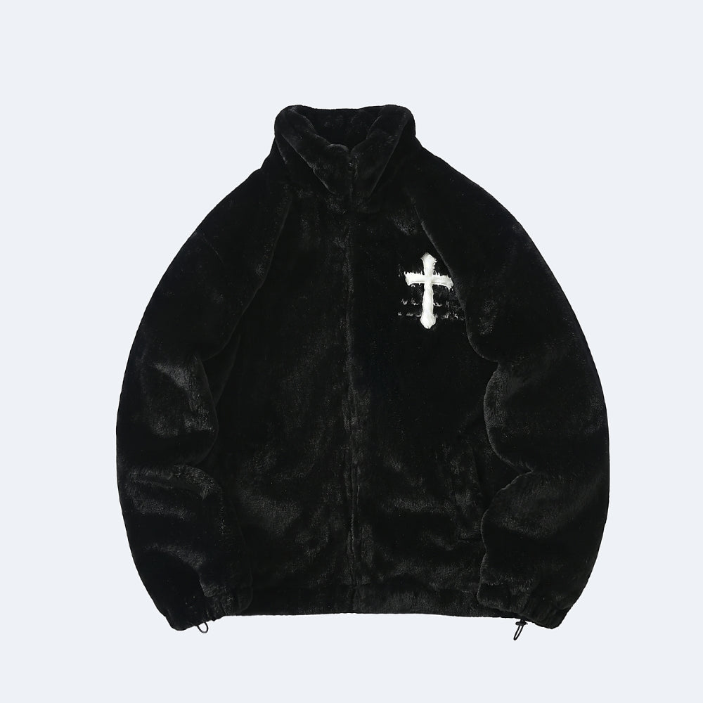 Black. A black plush fleece jacket with a high collar and a white cross patch on the left chest, displayed flat.