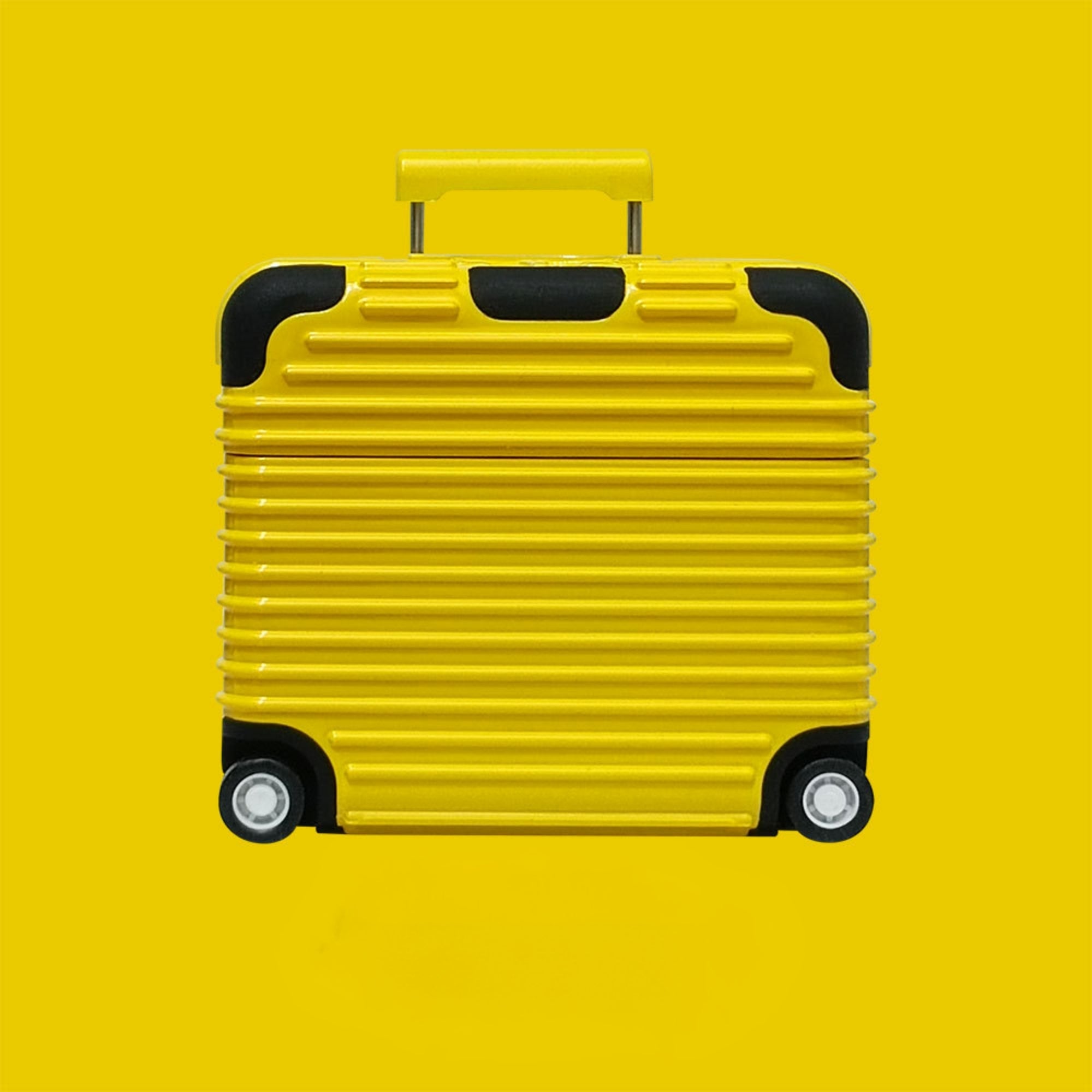 Yellow suitcase AirPods case with black wheels and handle on a yellow background