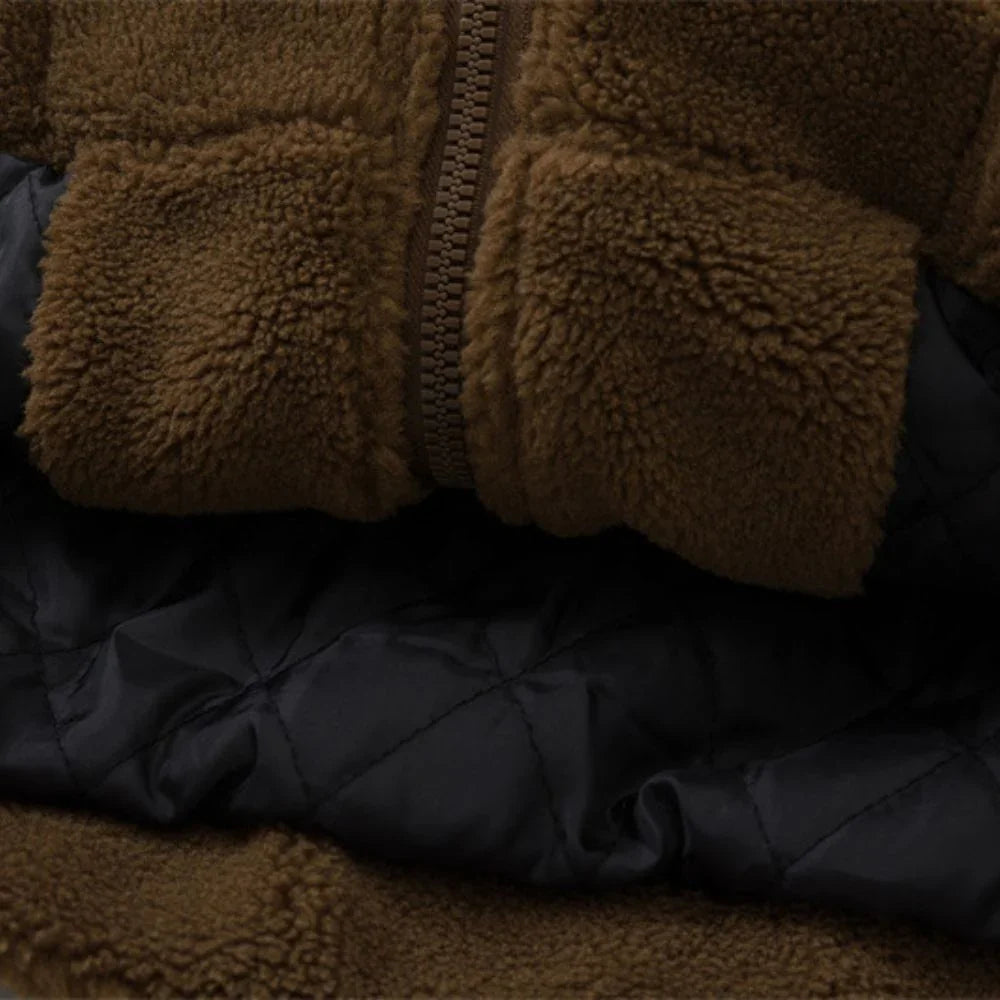 Close-up of a brown textured jacket and black fabric