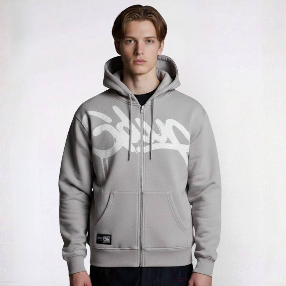Person wearing a gray hoodie with a white logo on a white background