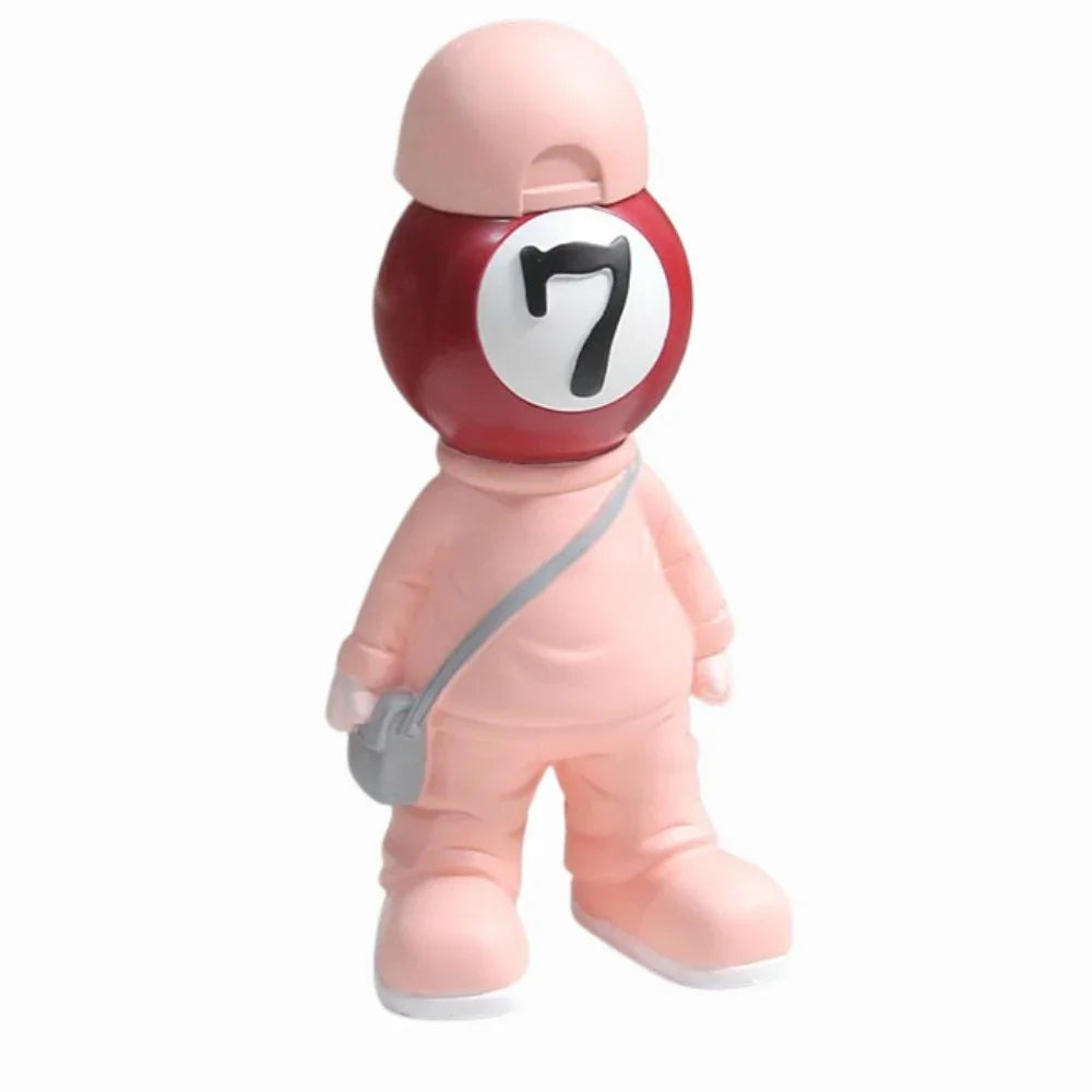 Toy figure with a red ball on top of its head, resembling a billiard ball, on a white background.