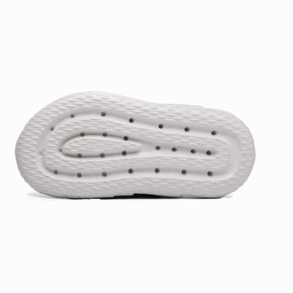 White shoe sole with textured pattern on a white background