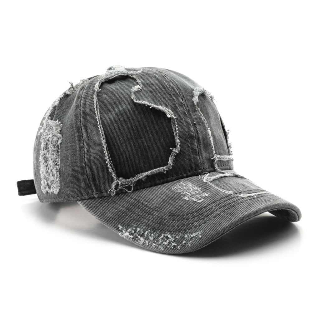 Distressed gray denim cap on a white background