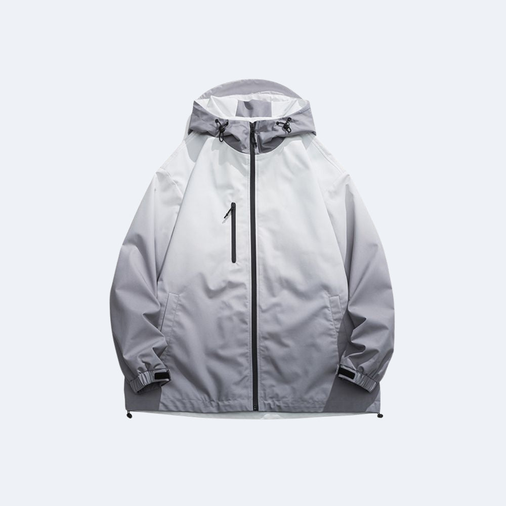 Gray. A light gray hooded jacket with a black front zipper and a vertical black chest zipper pocket.