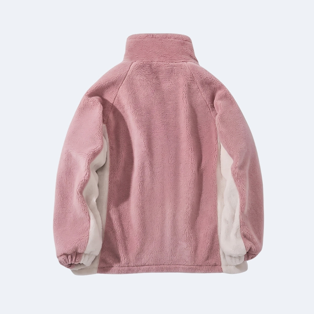 Pink. A dusty pink fleece jacket with contrasting light beige inner sleeves, shown from the back.