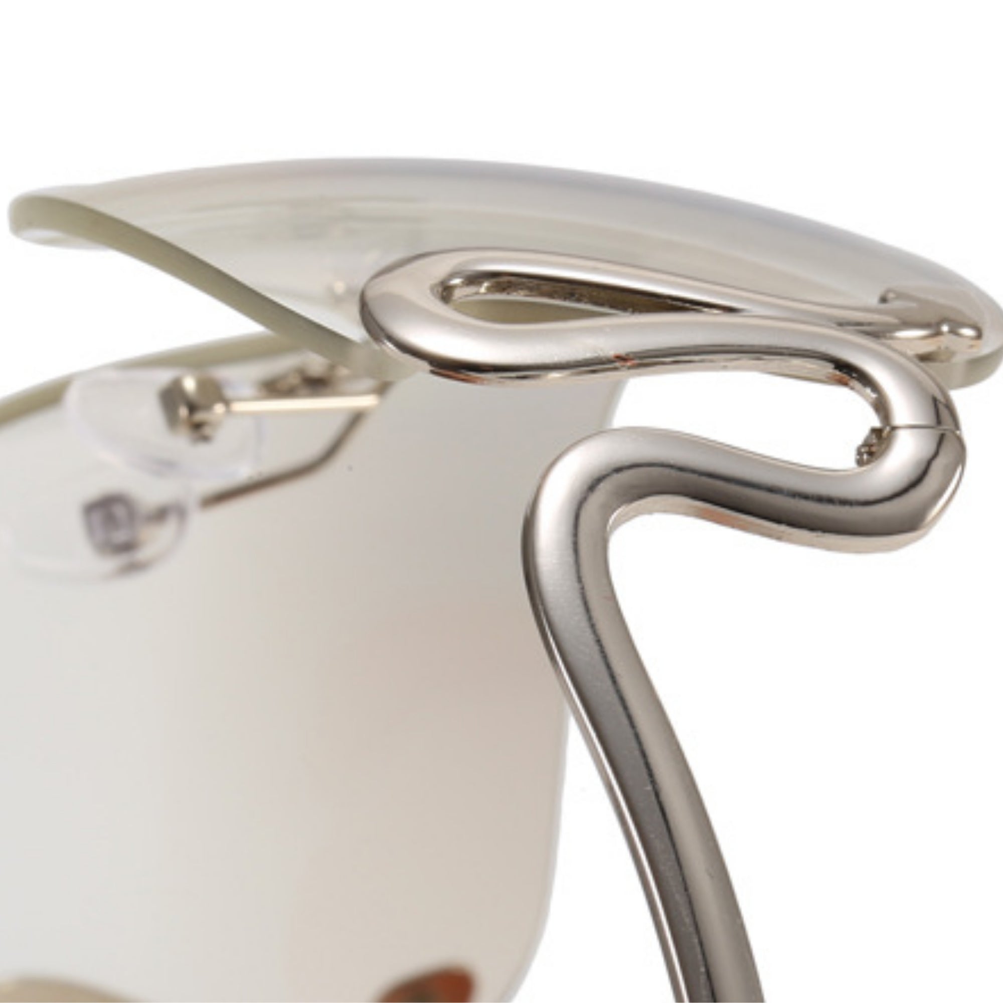 Close-up of a silver sunglass on a white background
