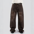 Brown jeans worn by a person on a light gray background