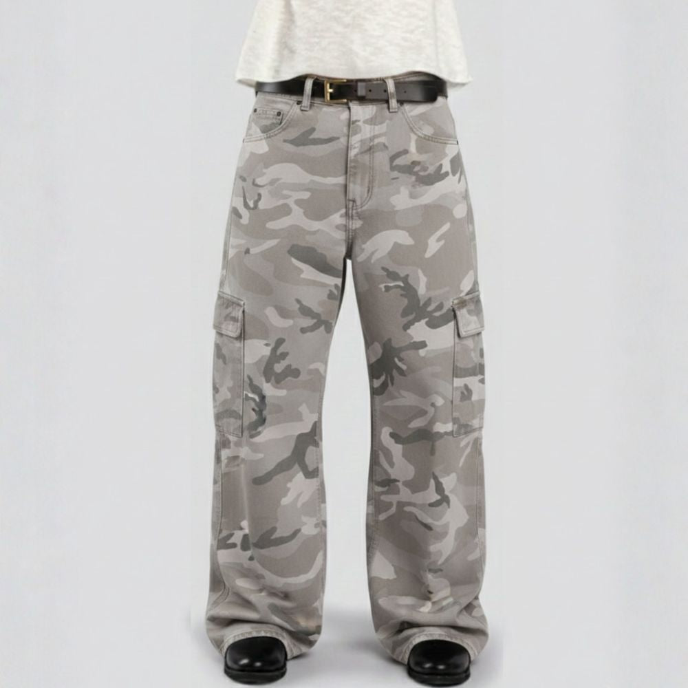 Camouflage pants worn by a person on a white background