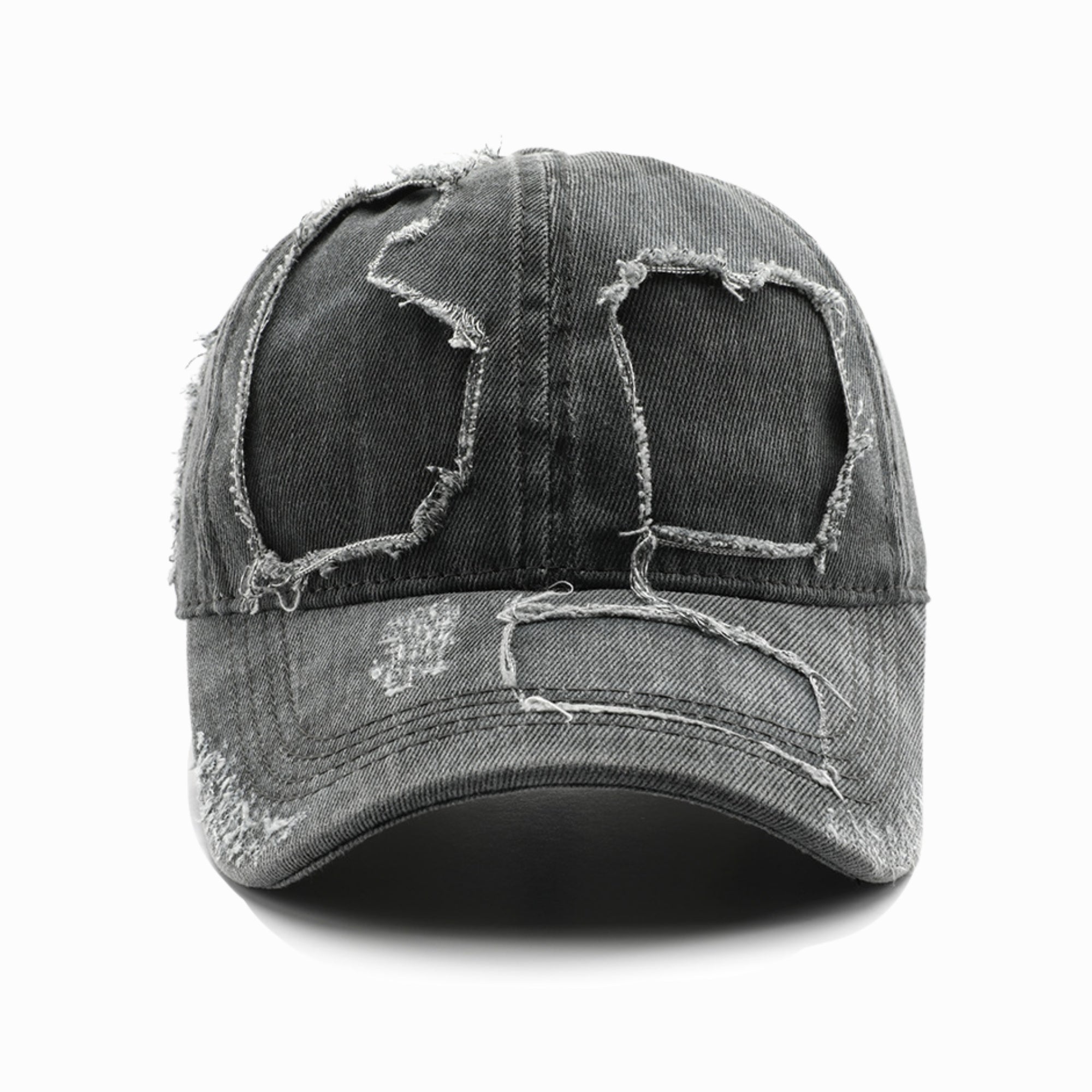 Distressed denim cap with worn-out design on a white background