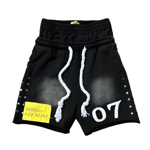 Black shorts with white drawstrings and '07' on a white background